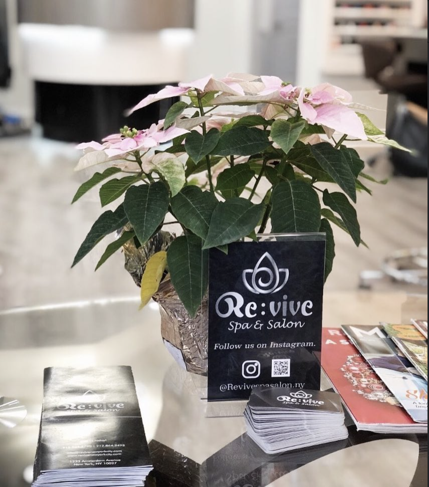 Re:vive Spa & Salon reception with sign