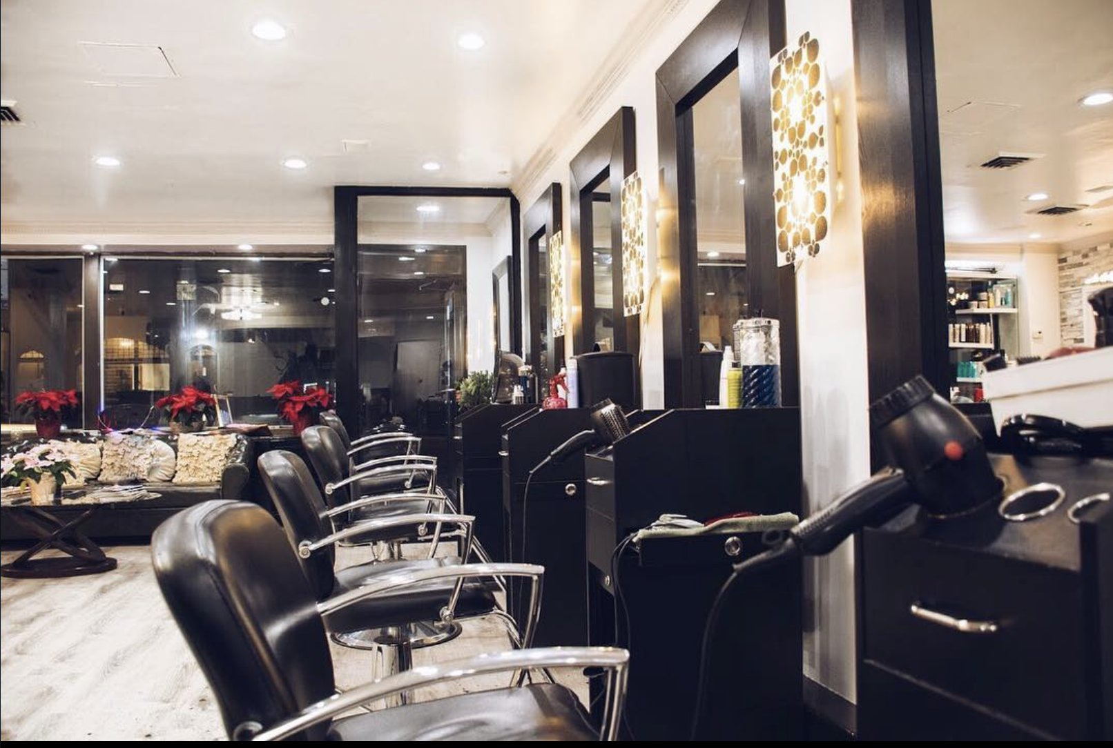 Re:vive salon — upscale styling station with gold wall sconces